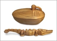 Wooden bird and crocodile made by prisoners in Butare prison