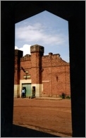 Guard standing outside Kigali Central Prison